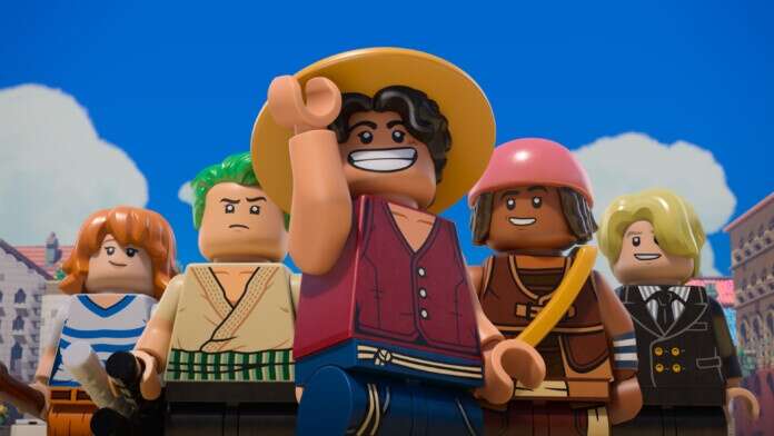 "Group of five LEGO minifigures in colorful outfits posing outdoors with blue sky and clouds, buildings in the background, central figure smiling and wearing a straw hat."